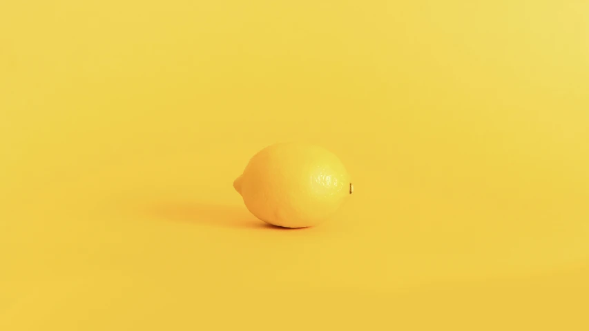 a single lemon sitting in the middle of yellow