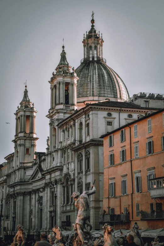 the building has large windows and an intricate dome