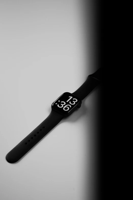 a black and white po of a watch showing time