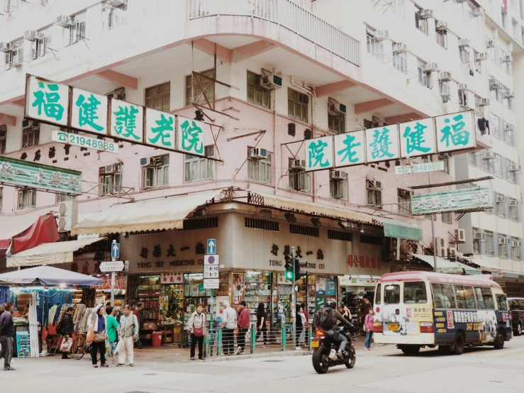 an asian city street vendor and their vehicle