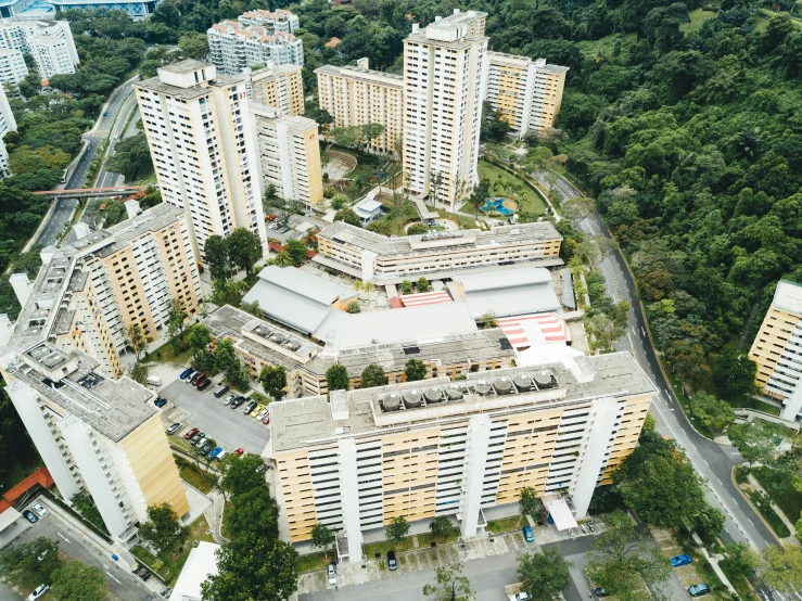 the aerial view of large buildings in a city