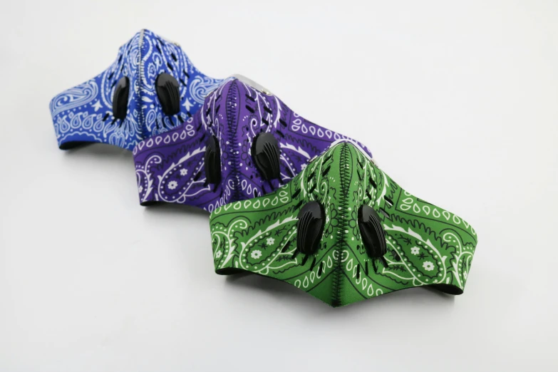 a group of ties folded on top of each other