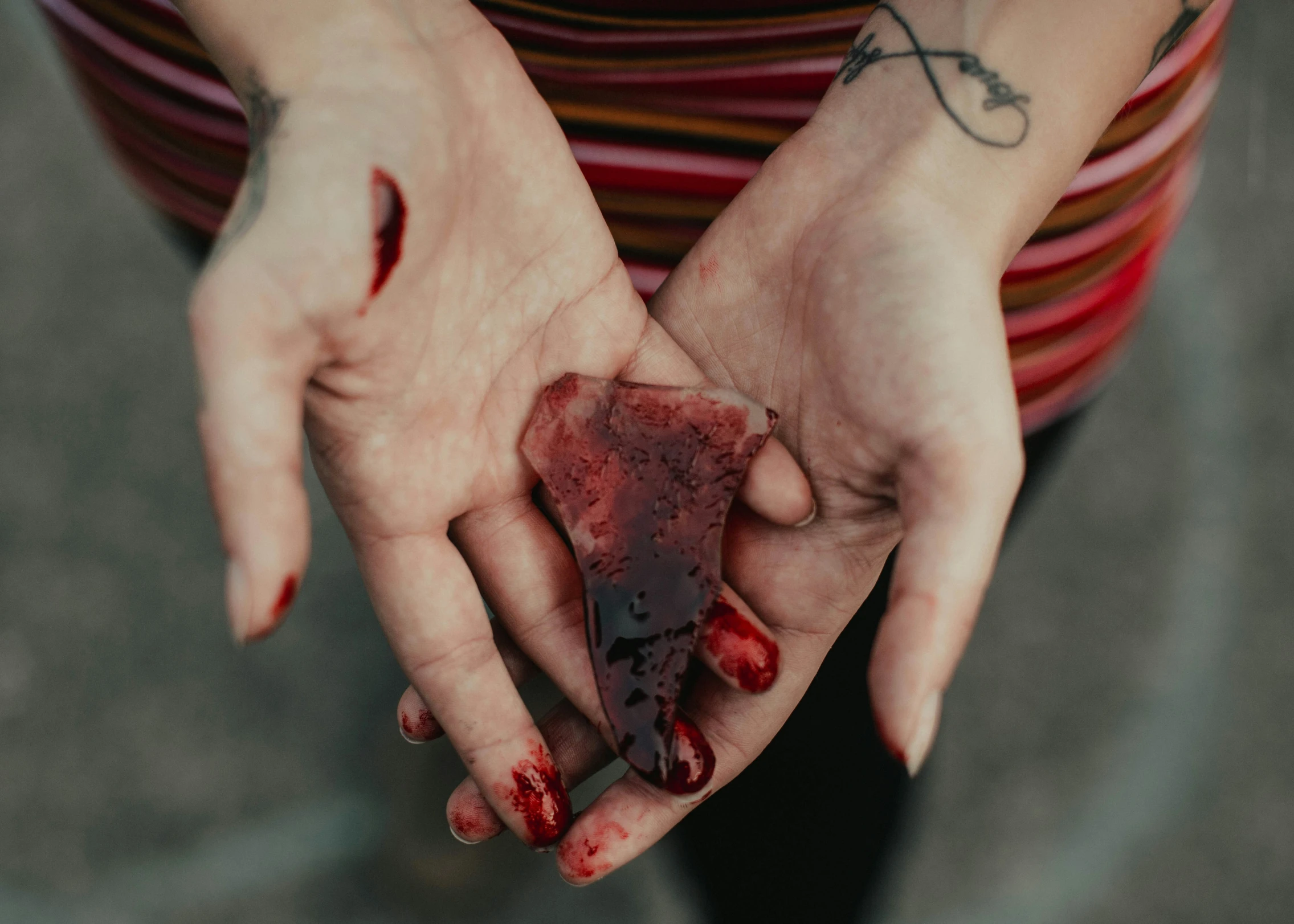 a woman holding out her left hand for her next nail art project