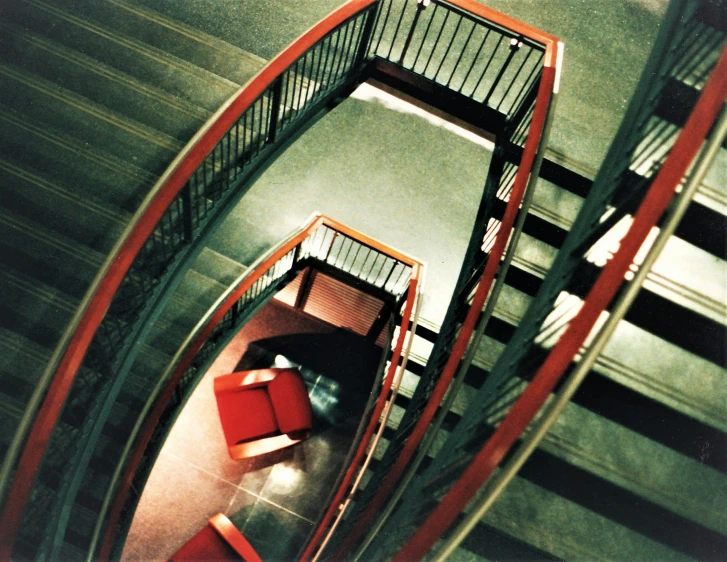 the inside of an iron staircase in an empty building