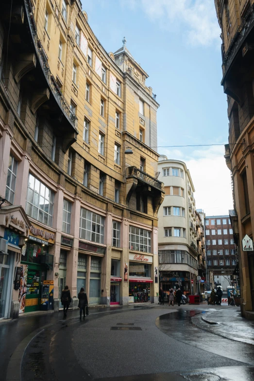 people walking in the middle of an urban area