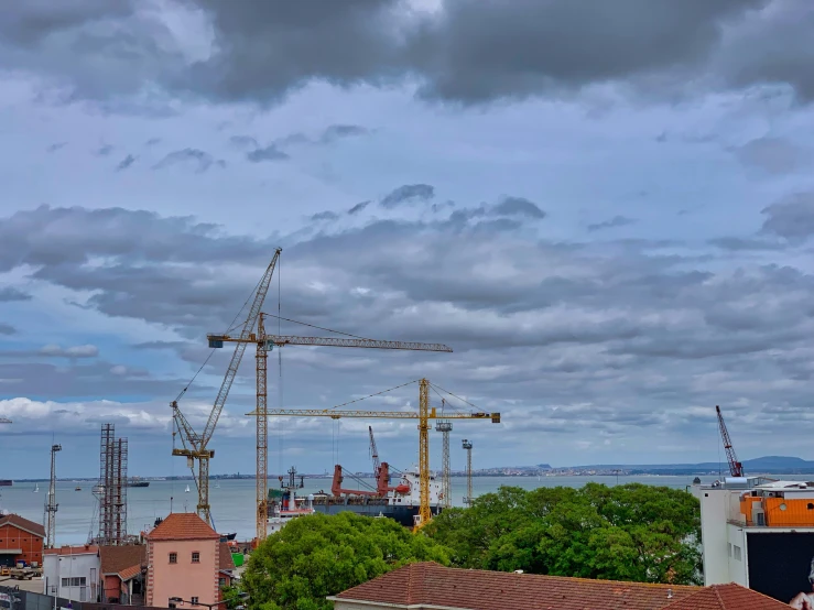 a building and crane in an urban setting