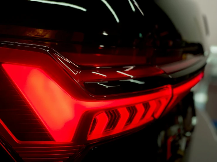 the back end of a red sports car