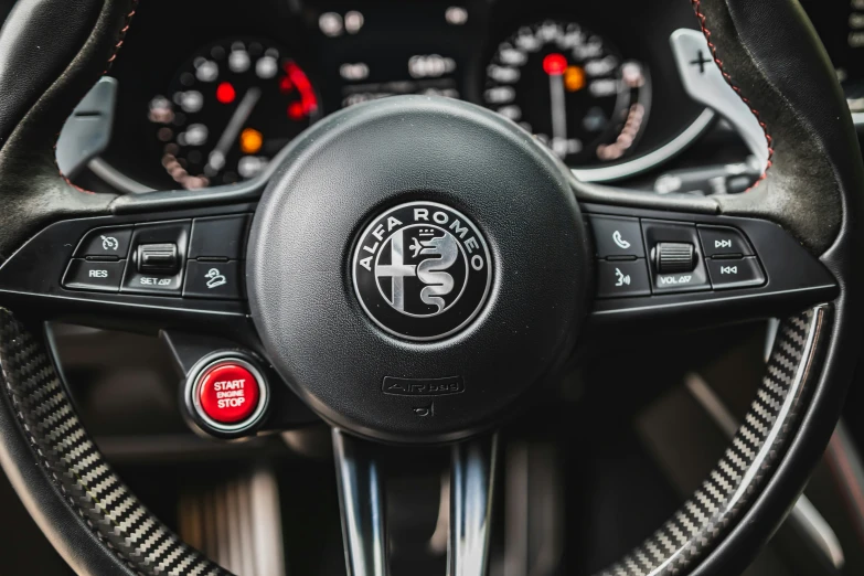 the steering wheel and gauges of a vehicle