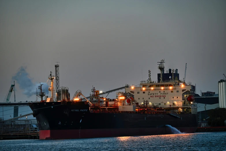 a large cargo ship sailing across the water