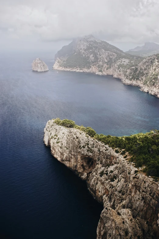 an island with some very big rocks by water