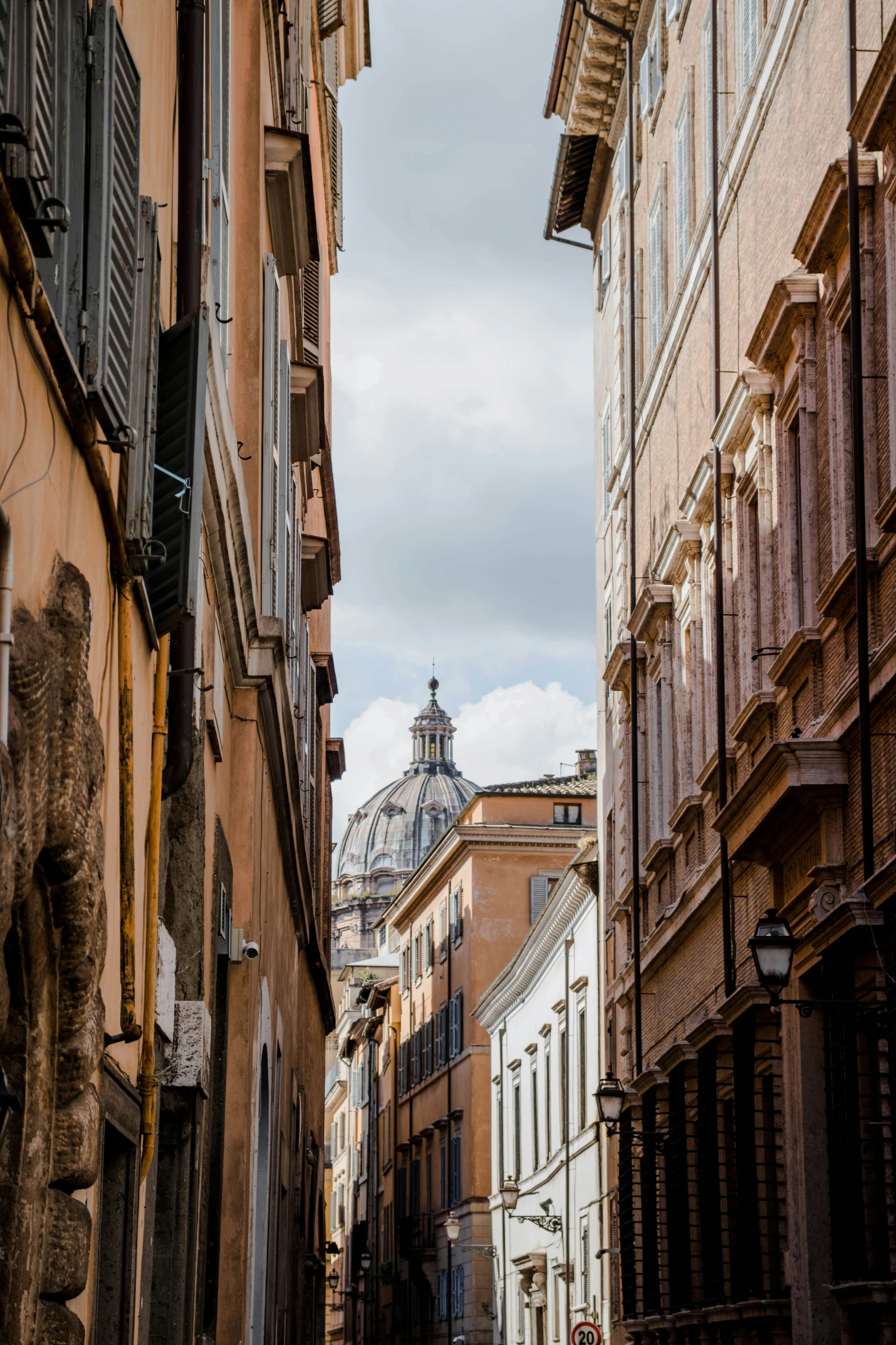 narrow street lined with buildings in a city