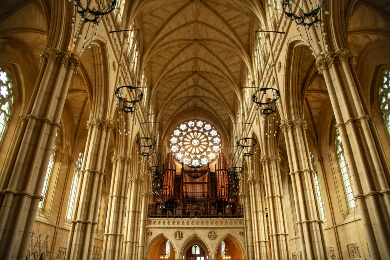 the interior of an cathedral, with a large clock