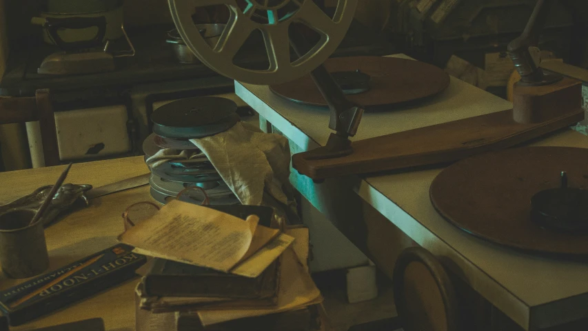 a table with some wooden objects and some papers on it