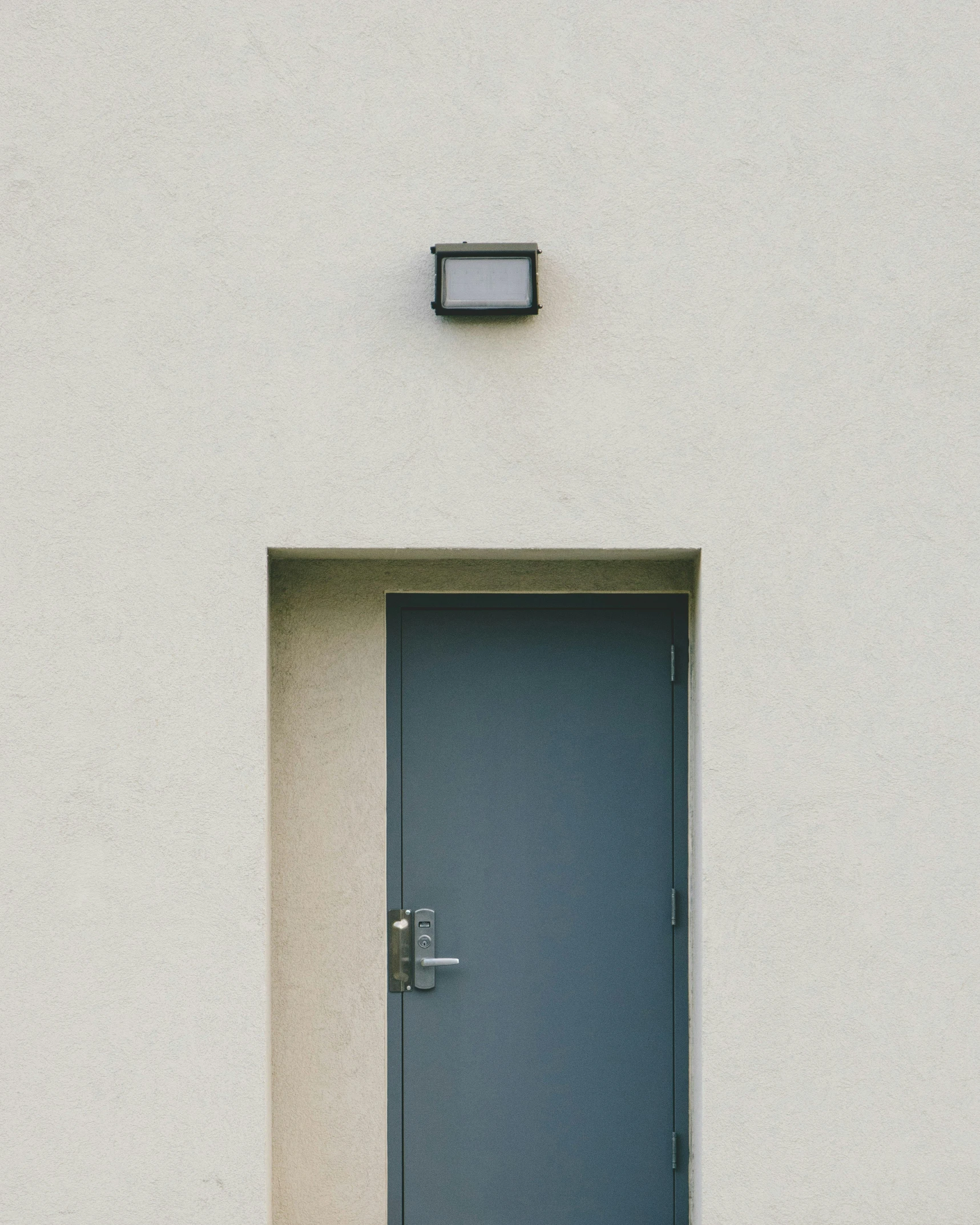 the door is opened to the white exterior