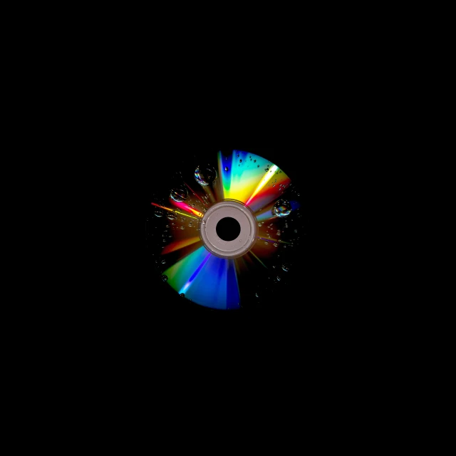 the dvd is colored multi - colored and the disk is blurred