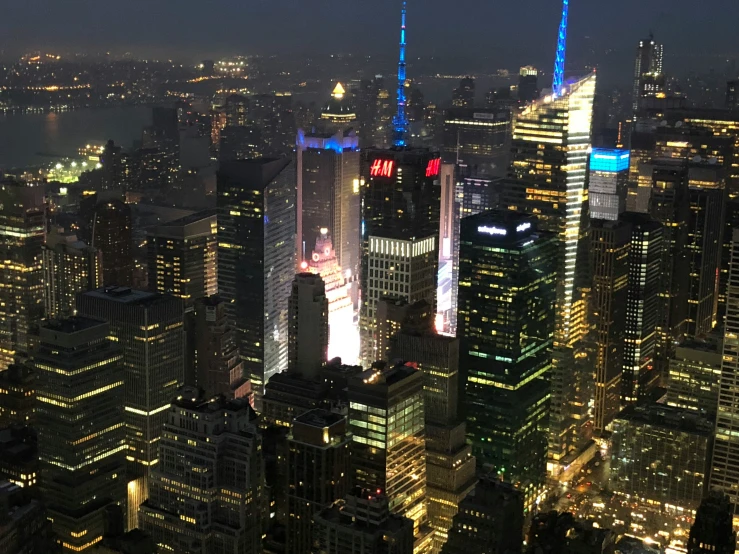 aerial view of cityscape with lights in middle