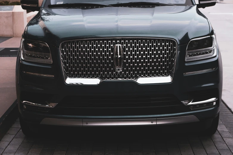 front grille of an elegant black luxury car