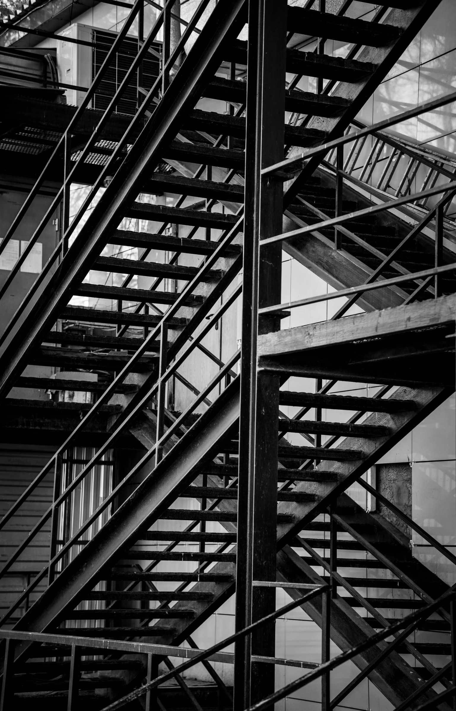 a steel stair is seen in this black and white po