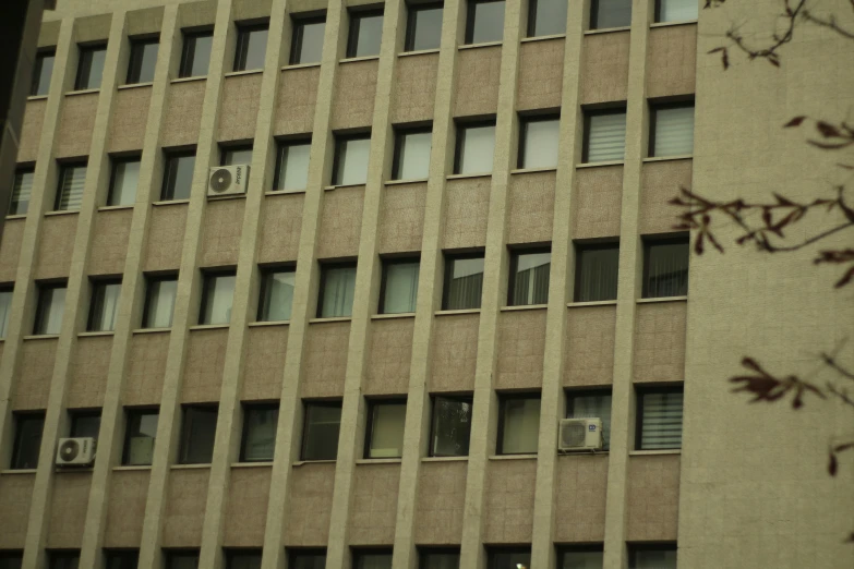 this building has some windows and a clock on it