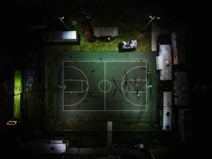 an overhead view of a soccer field at night