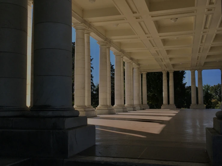 columns under an overpass at dusk on a sunny day