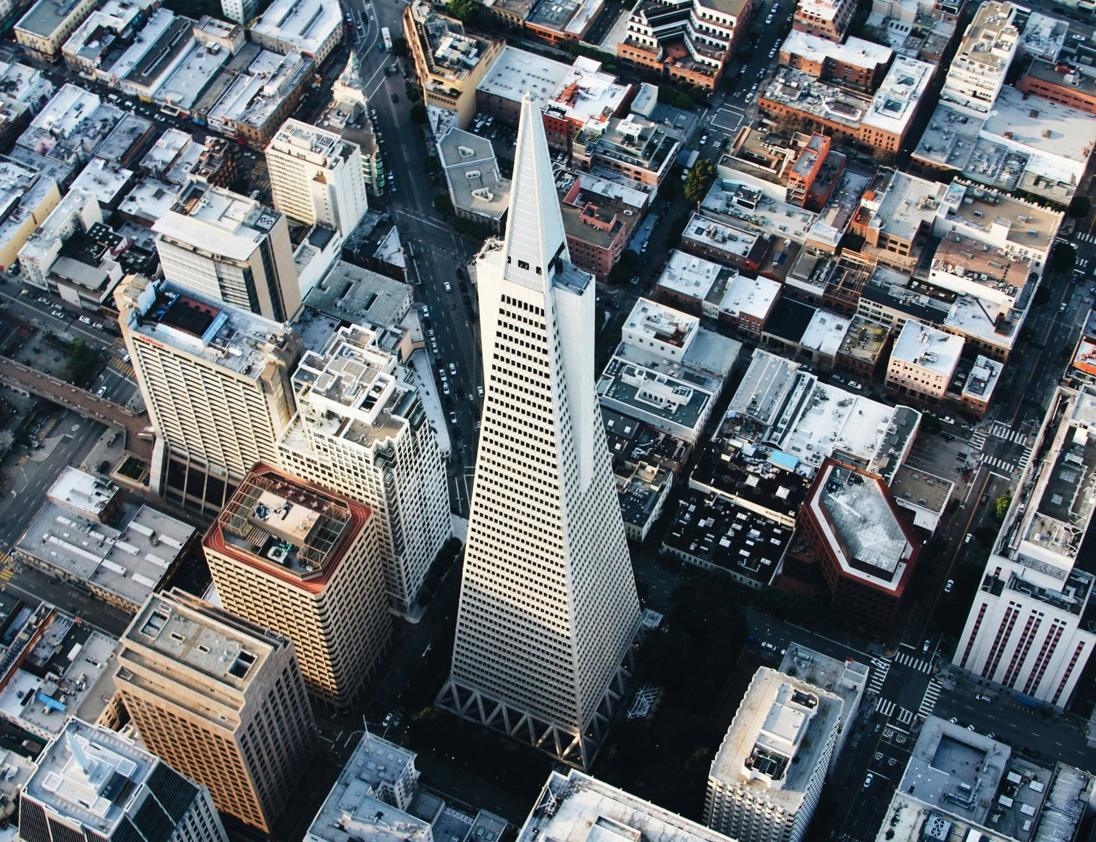 an aerial view of the towers and skyscrs of a city