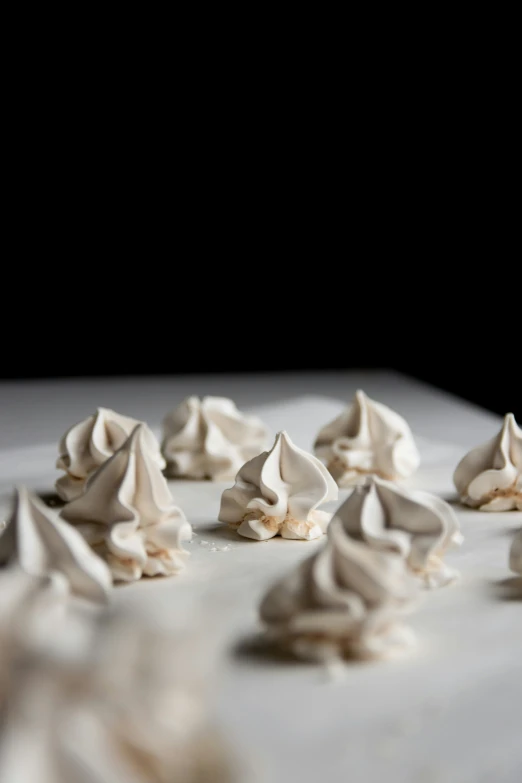 small pieces of whipped cream on a plate