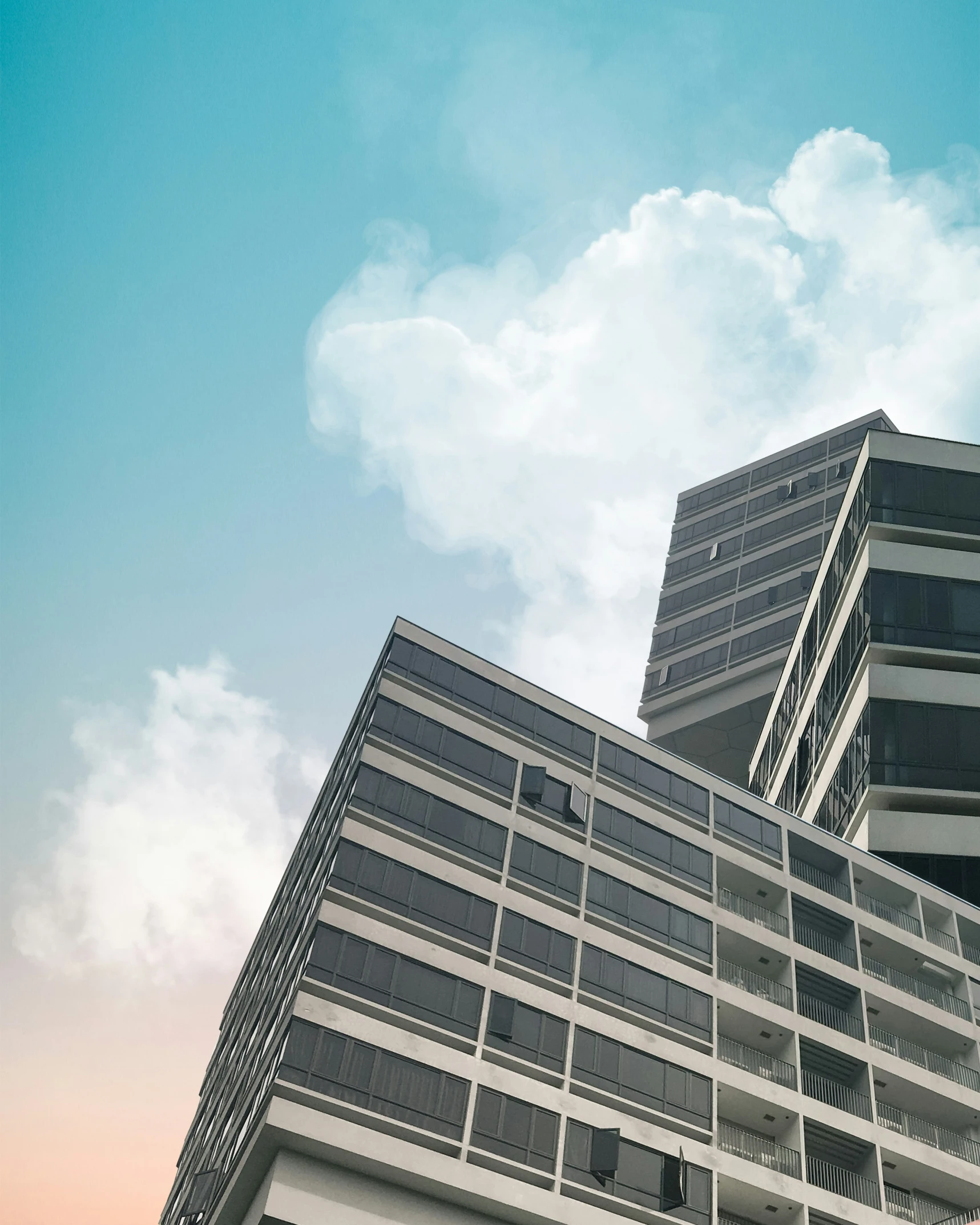 a tall building with a sky background