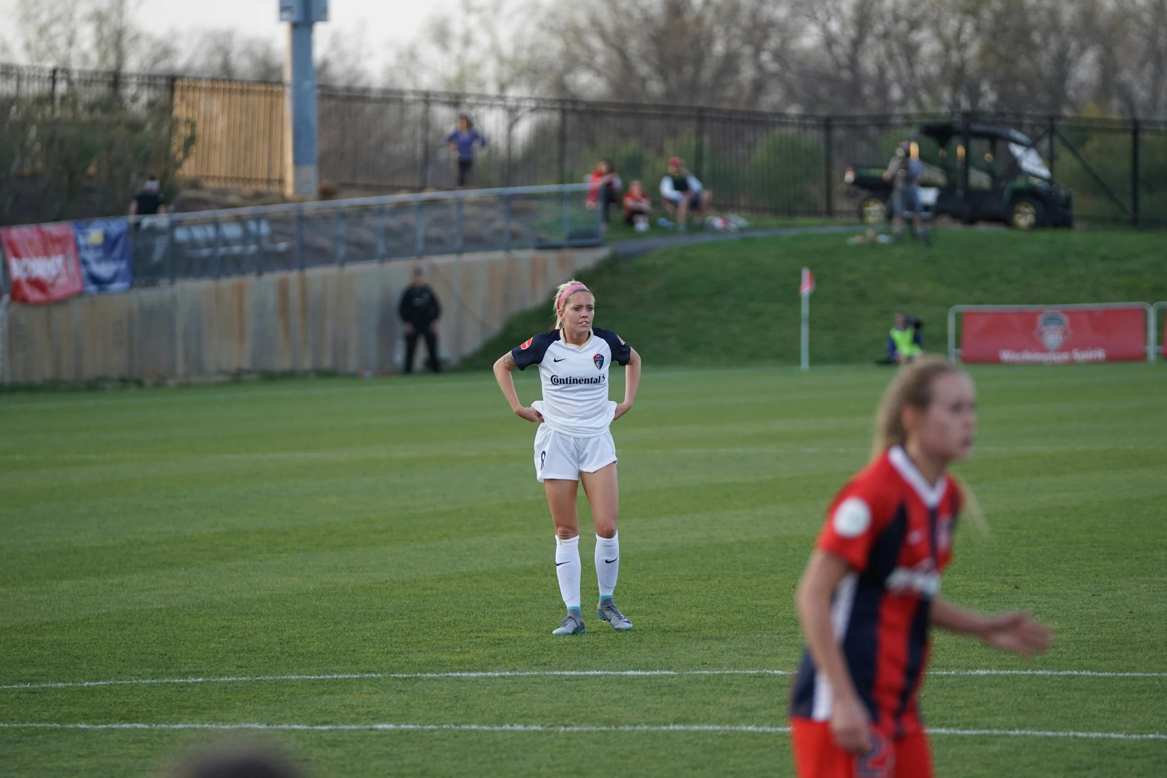 the soccer players are playing soccer on the field