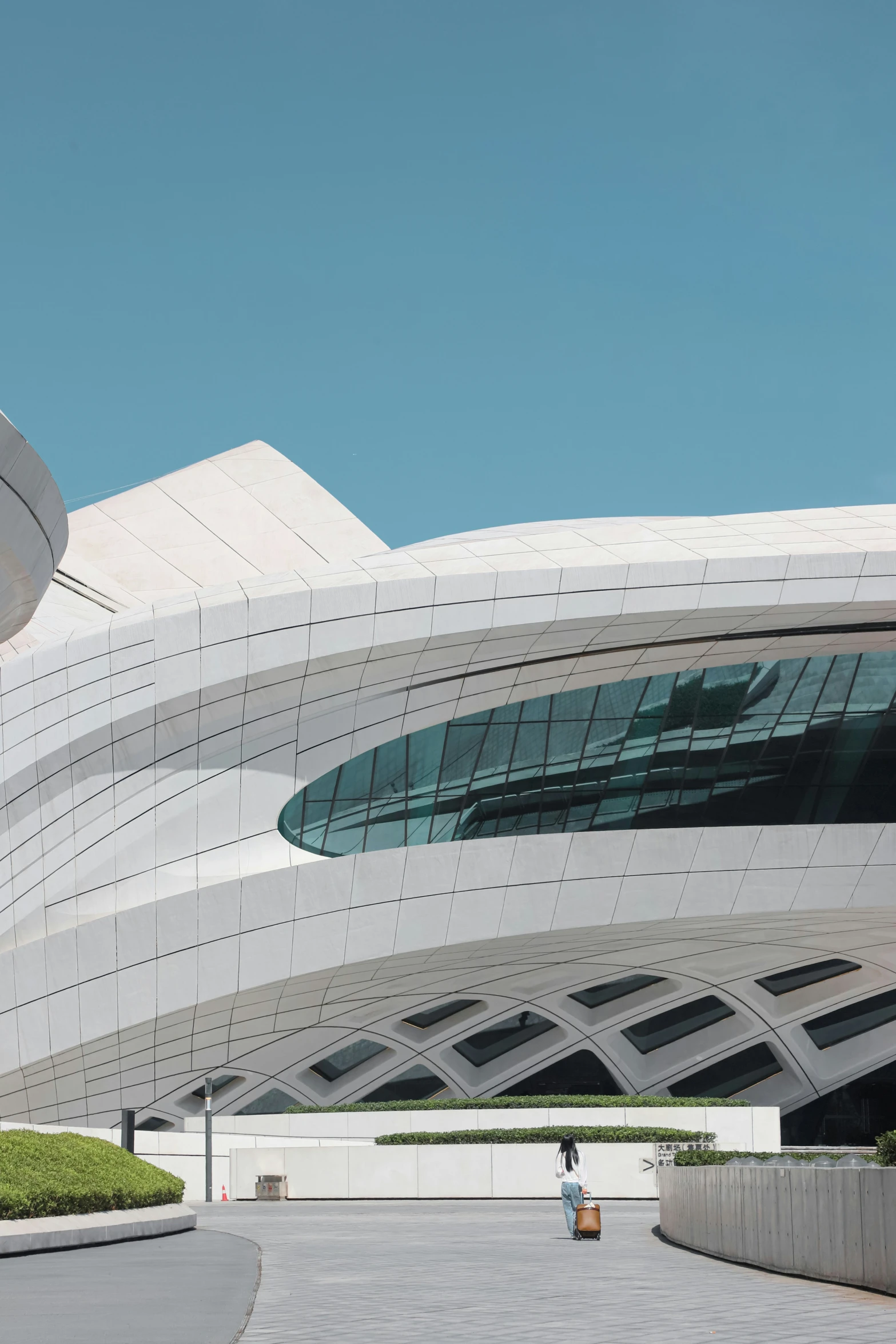 large building with white architecture at the entrance