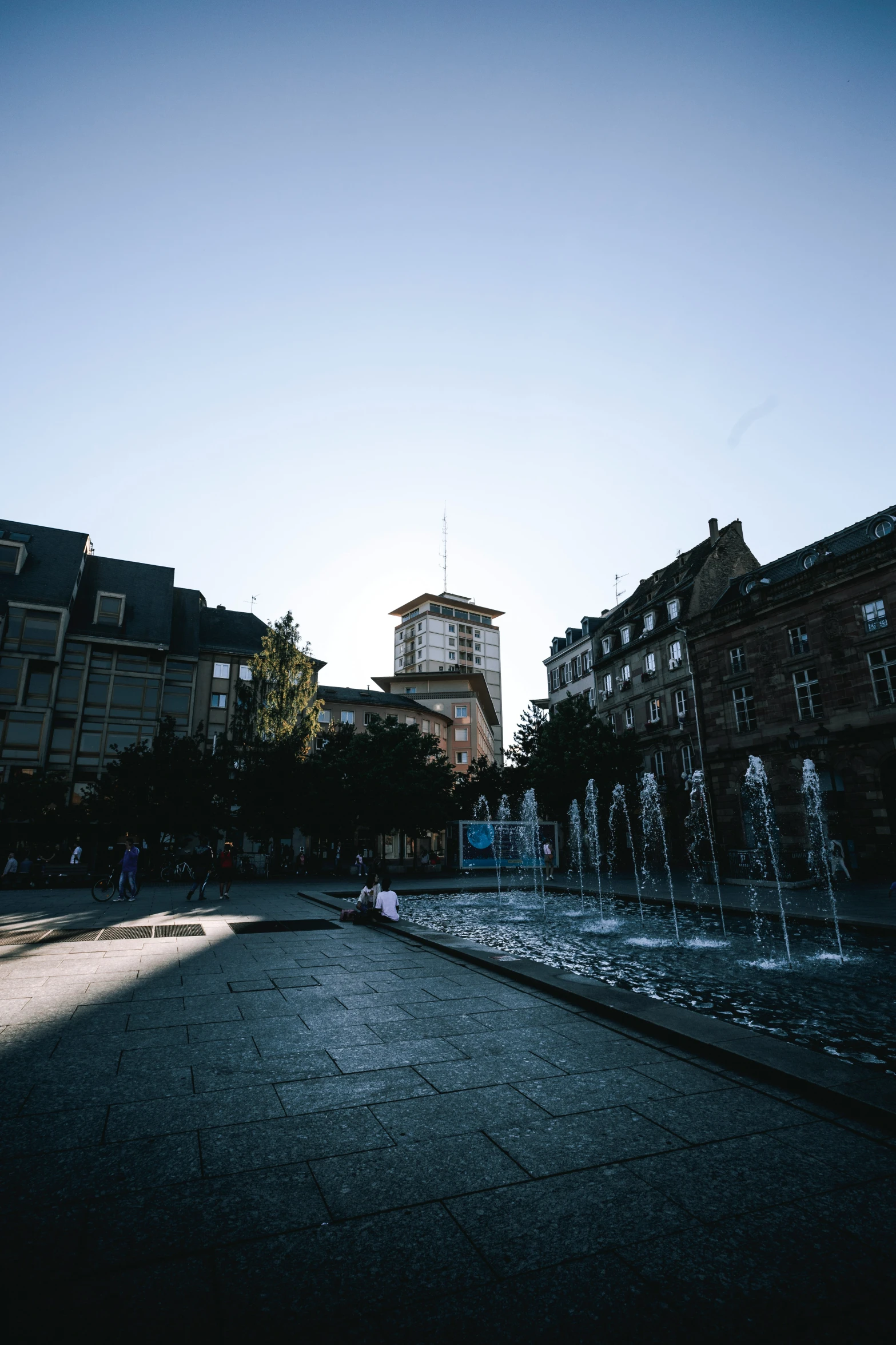 some kind of building with several fountains on top