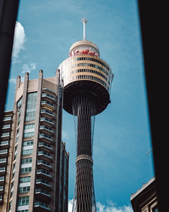 a tall clock tower towering over a city