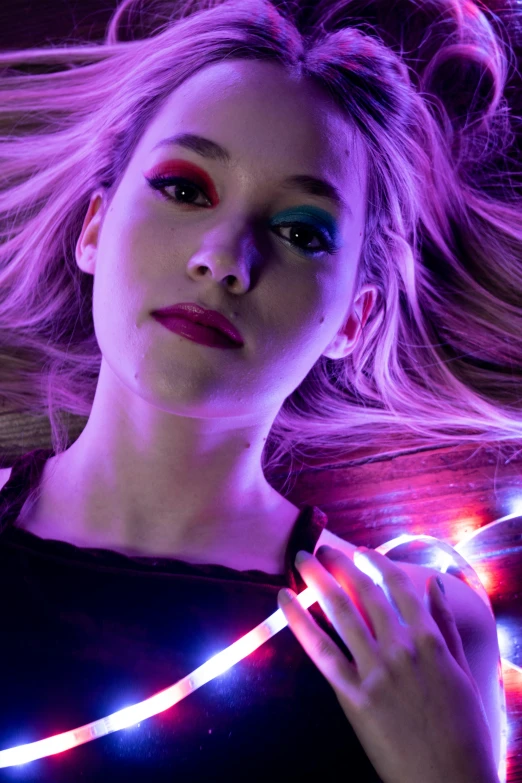 a woman wearing bright lights around her hair