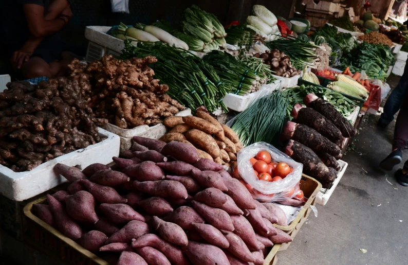 a table of food with lots of vegetables on it