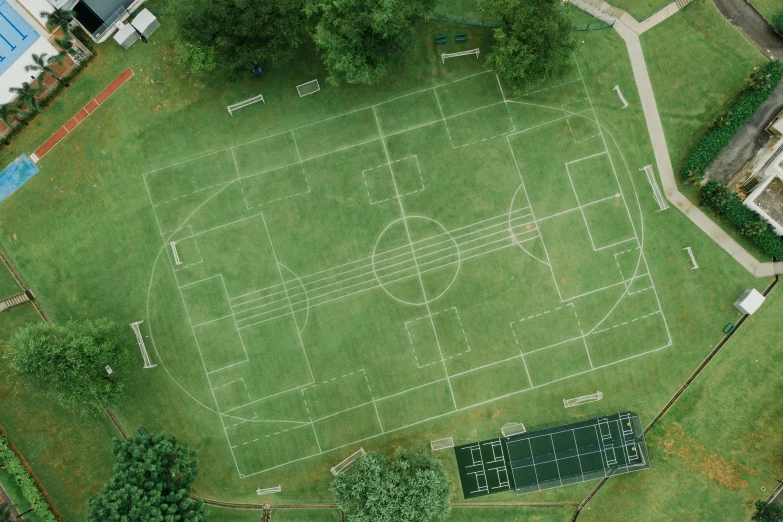 an aerial view of a field with football fields