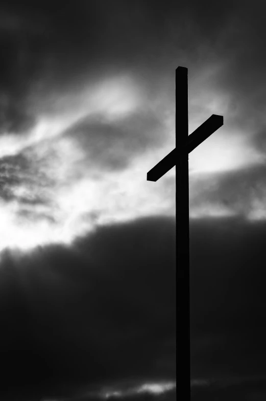 a black and white pograph of a cross