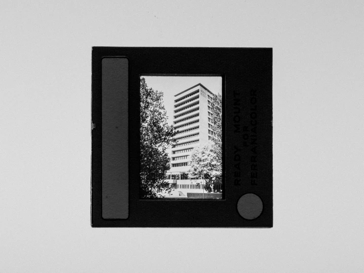 black and white image of office building through the window