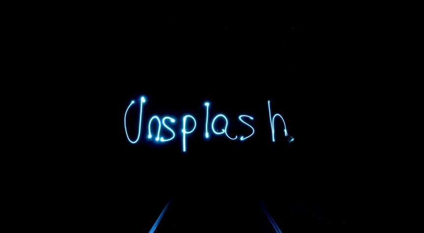 the words joseph with bright lights are spelled in cursive blue