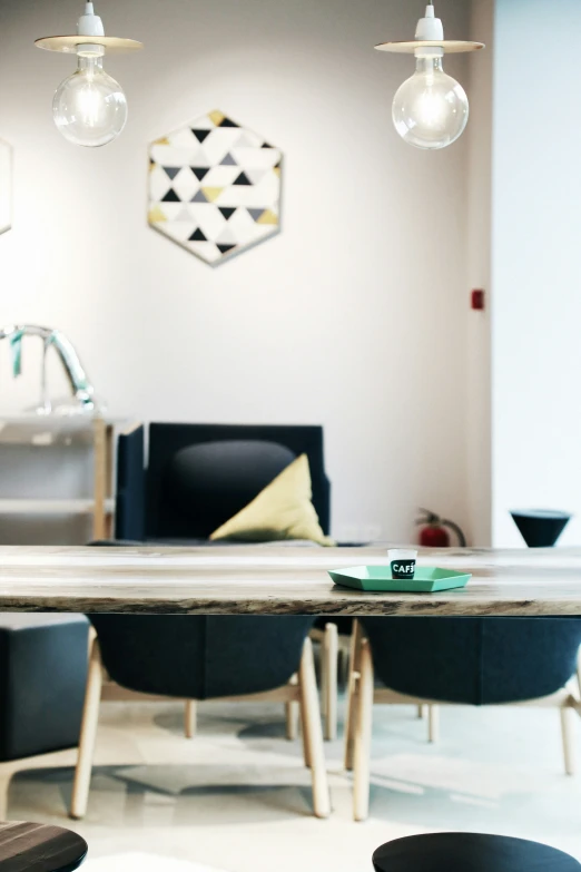 the modern dining room is clean and ready for guests