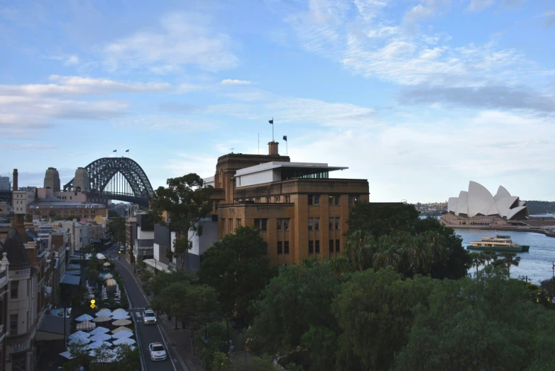 a view of the sydney harbour and opera from the top of a building