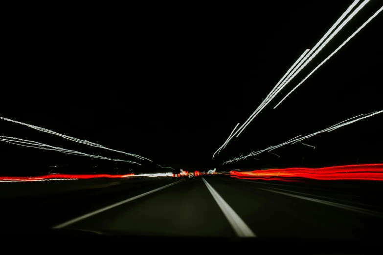 a view from the inside of a car at night