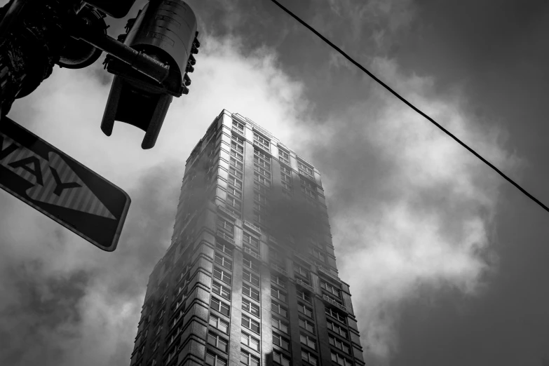 a street light and some buildings with tall buildings