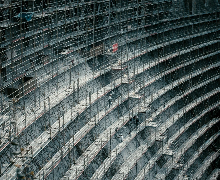 an overhead view of an arena at a train station