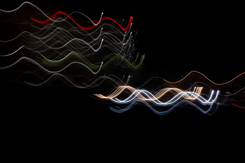 long exposure image of abstract light painting on black