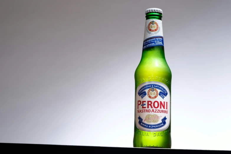 a close up of a beer bottle on a table