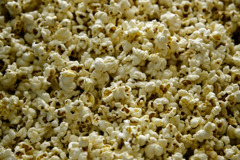 close up of a batch of popcorn being prepared to be eaten