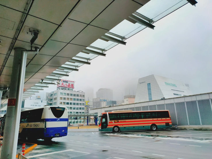 there is a bus parked on the side of the street