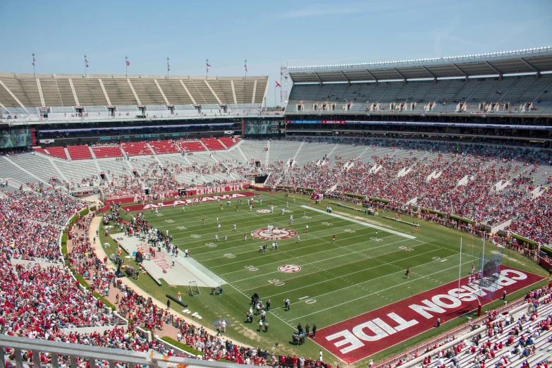 the stadium is full of fans at a game