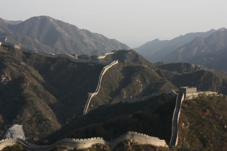 great wall in the china mountains and mountain range