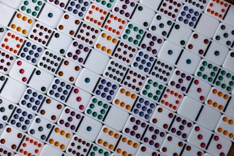 an array of colored dominos with many numbers